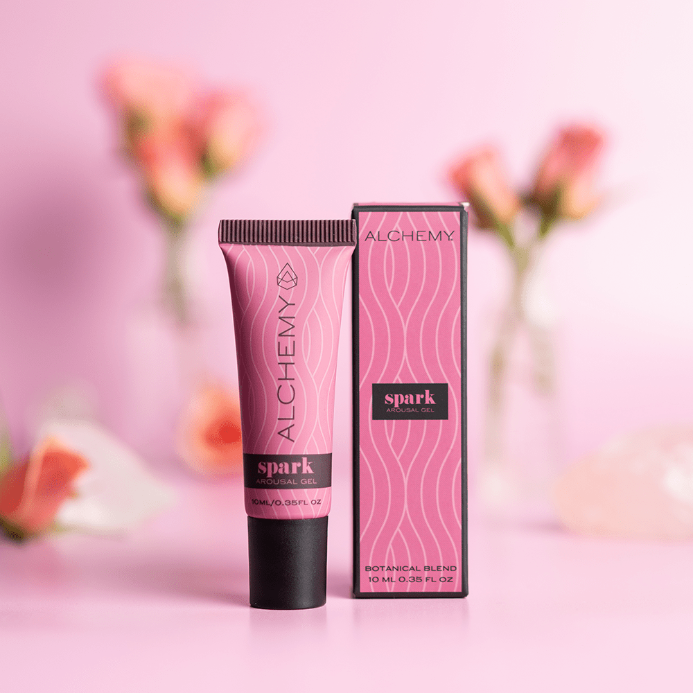 Alchemy Spark Female Arousal Gel 1oz tube with box on a pink background