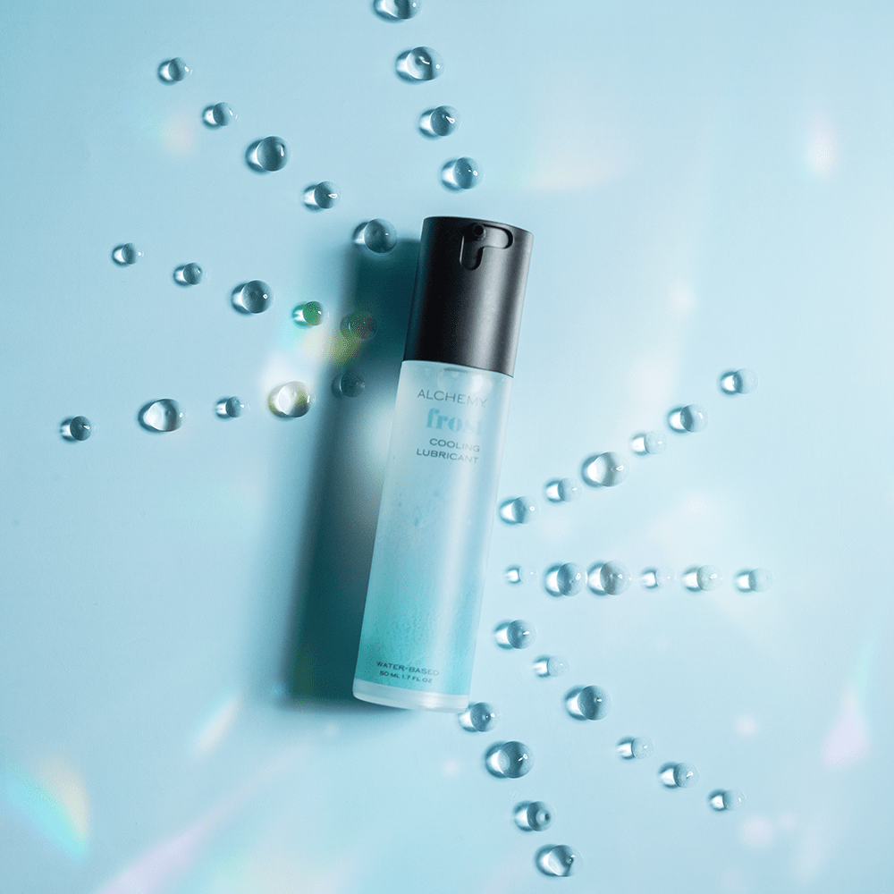 Alchemy Frost: Water-Based Cooling Personal Lubricant bottle with liquid droplets