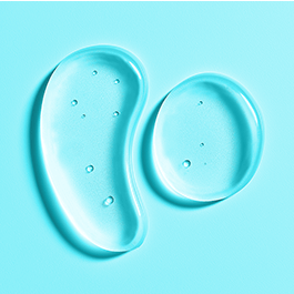 Lubricant top view on a blue background showing texture and viscosity