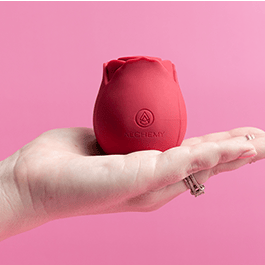Alchemy Rosebud: Luxury Air-Pulse Massager in woman's hand