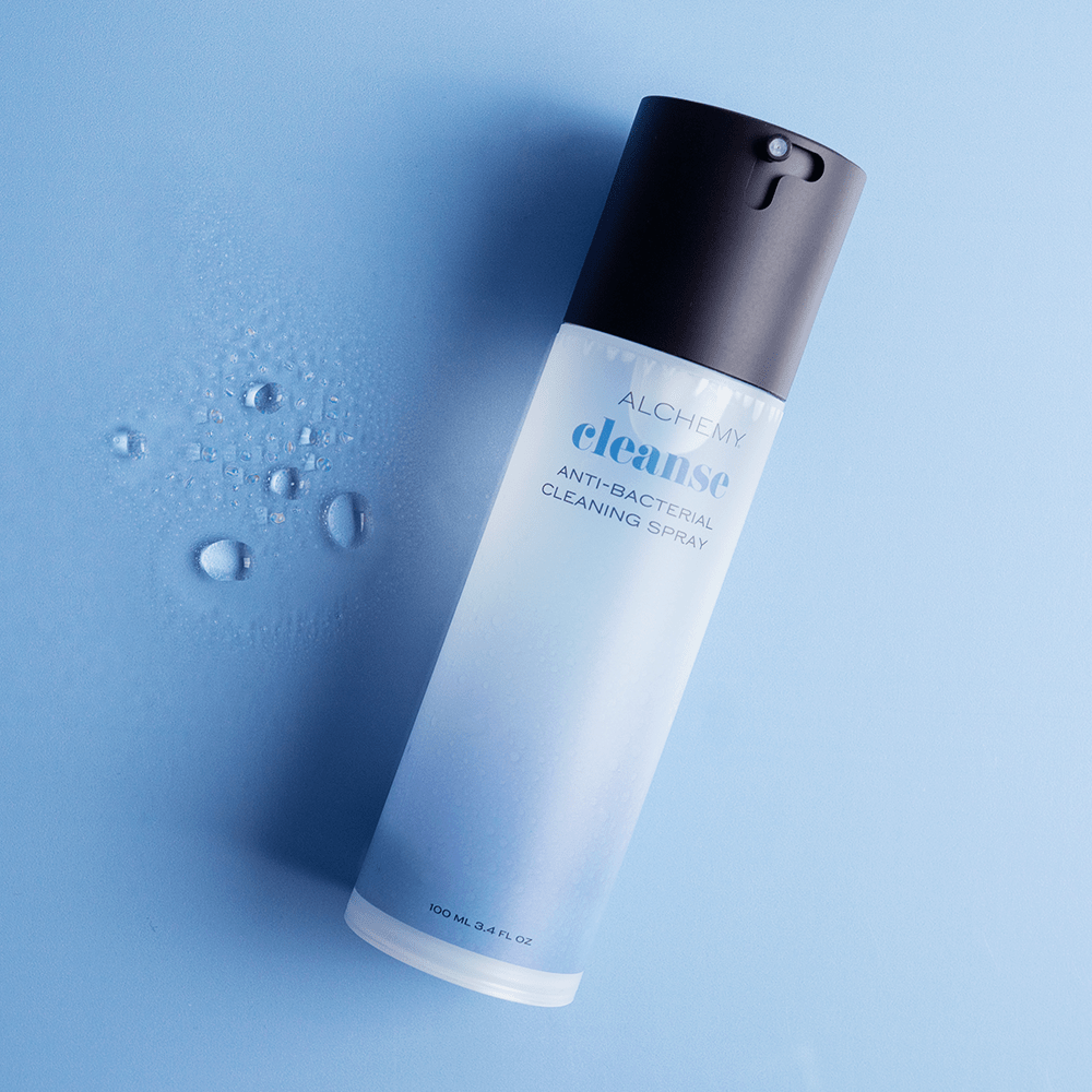 Alchemy Cleanse Antibacterial Toy Cleaner bottle with liquid droplets