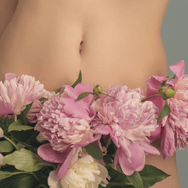 Body-safe: close-up of woman's torso with flowers