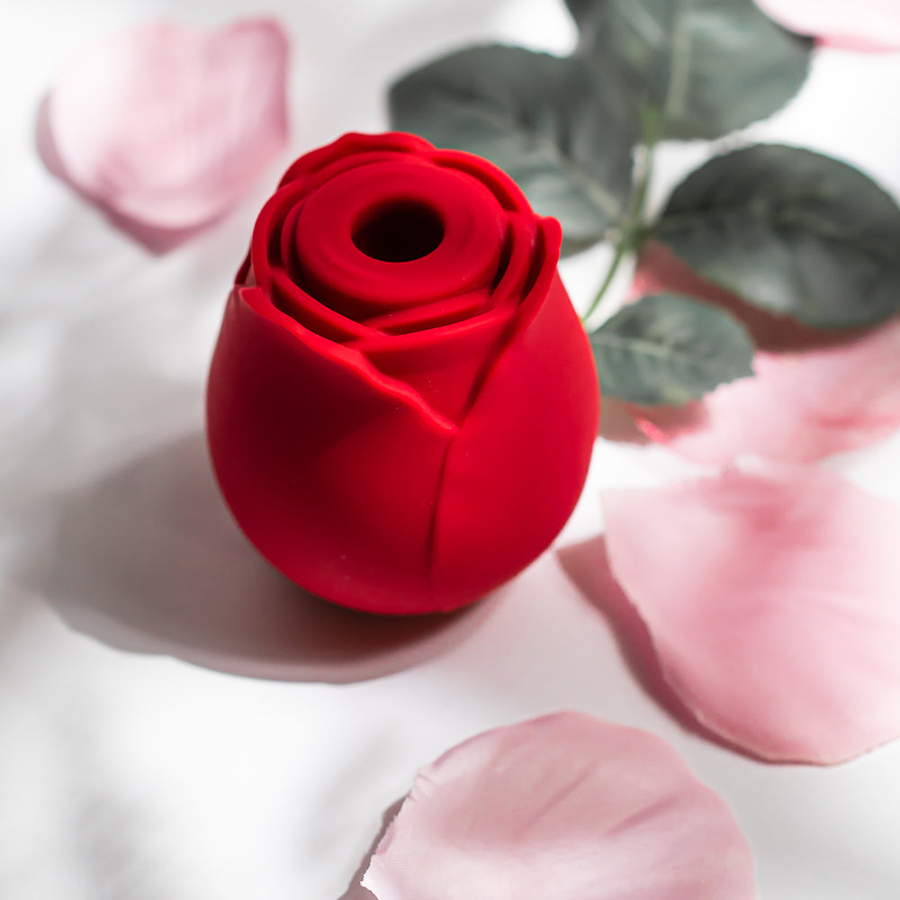 Alchemy® Original Rosebud Luxury Air-Pulse Massager | Top View with Rose Petals
